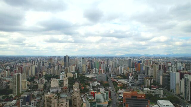 Center of the Batel neighborhood, in the city of Curitiba, state of Paran&aacute;, southern Brazil, aerial drone tour between the buildings