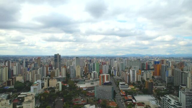 Center of the Batel neighborhood, in the city of Curitiba, state of Paran&aacute;, southern Brazil, aerial drone tour between the buildings 