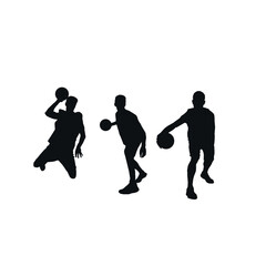 Silhouette of basketball players in action with the ball