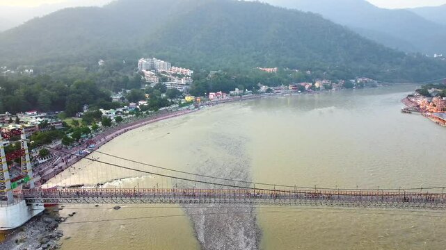  Aerial view of Janki setu bridge across the river ganga, city of rishikesh in the Indian state of uttarakhand India