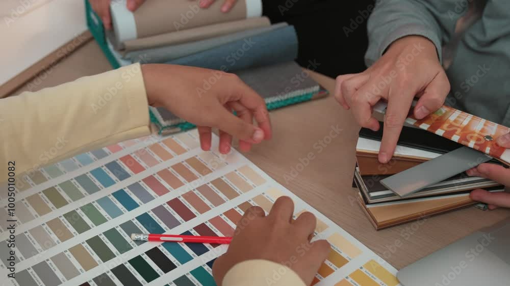 Poster slow motion hand closeup of professional architect and interior designer presenting material and col