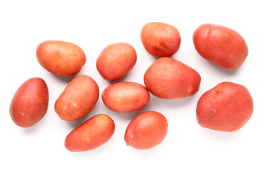Many fresh raw potatoes on white background