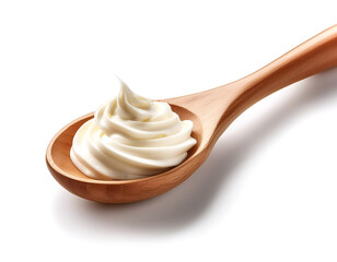 Wooden spoon filled with buttercream on white background