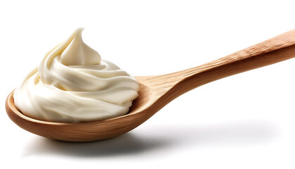 Wooden spoon filled with buttercream on white background