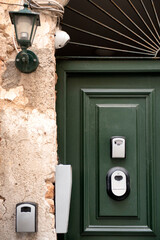 Key lock boxes by the door of holiday rental flats