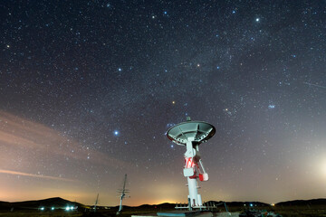 radio telescope on the background of stellar tracks, The observatory's radio telescope