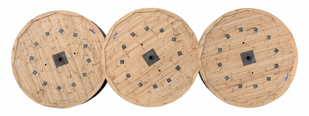 Wooden heavy cable reels, three vintage wood bobbins, electric fiber optic cables drums, electrical wires spools, steel wire cables industry large detailed isolated horizontal closeup white background