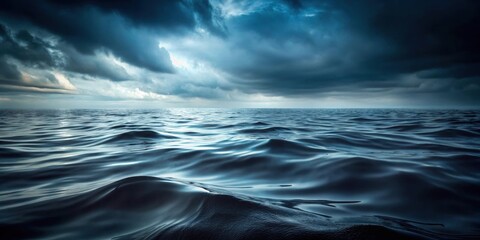 Fototapeta premium Dark and gloomy surface of water , eerie, spooky, murky, ominous, mysterious, reflective, still, calm, tranquil, somber, despair