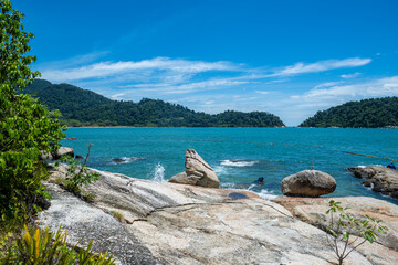 This breathtaking image captures the essence of a secluded tropical paradise.  The crystal-clear...