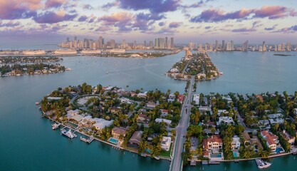 The Venetian islands at sunrise in the Biscayne Bay wih a view to downtown Miami, Florida, United...