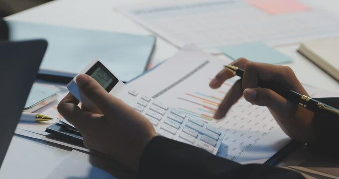 Accountant or banker making calculations Bookkeeper Clerk, Bank Advisor And Auditor. Accounting concept.