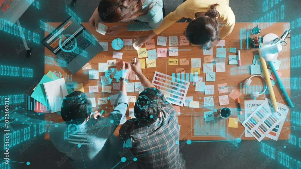 Aufkleber top down view of business team with casual outfit looking laptop screen and sharing idea. aerial vie