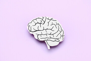Paper human brain on lilac background