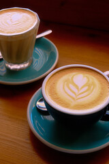 two lattes on a coffee table
