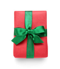 Red Christmas gift box with green ribbon on white background