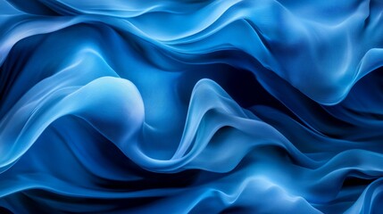 Obraz premium Abstract blue wave art with flowing, smooth curves. The design features various shades of blue blending seamlessly, creating a serene and dynamic visual