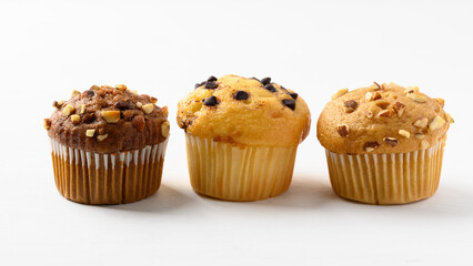 Chocolate almond muffin, Vanilla chocolate chips muffin and Vanilla almond muffin on white background