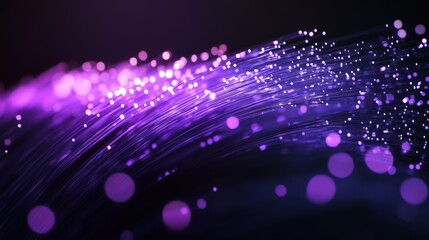 A vibrant abstract representation of light and energy in shades of purple.