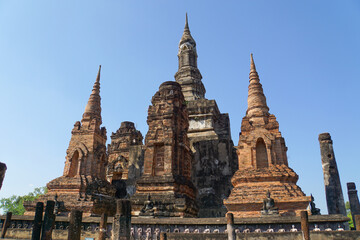 Fototapeta premium Beautiful antique,art, pagoda sculpture, architecture at Sukhothai historical park 