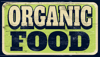 Aged and worn organic food sign on wood