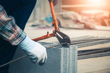 A careful examination of steel beams during the engineer’s inspection.