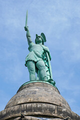 Hermannsdenkmal in Gemany, close-up of imposing bronze statue of cherusci war chief Arminius or Hermann in German holding sword