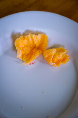 close up of teriolassi crackers on white plate, crackers as a side dish.