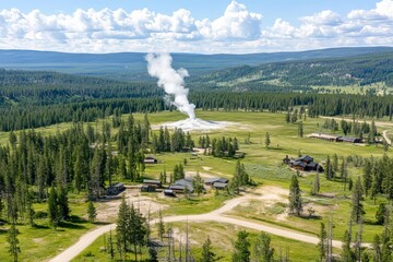 Fototapeta premium Aerial view of geyser erupting in Yellowstone, steam rising, open landscape, room for text