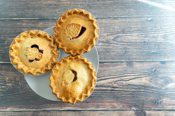 Apple, blueberry and Strawberry rhubarb pies ready to eat