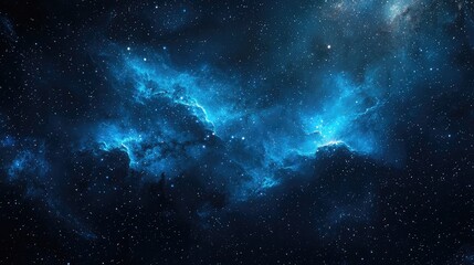 Fototapeta premium A breathtaking view of a deep space nebula showcasing vibrant shades of blue against a backdrop of shimmering stars.