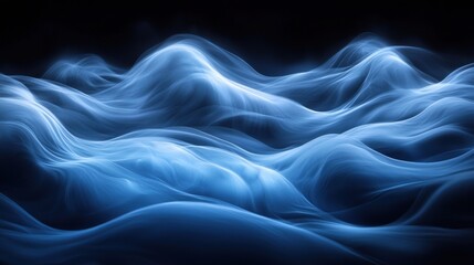 Fototapeta premium Ethereal blue waves undulating gracefully in a darkened space, creating an atmospheric and calming visual effect