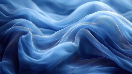 Fototapeta premium Blue sheer fabric flowing gracefully in soft waves, illuminated by gentle light, creating a tranquil and serene atmosphere