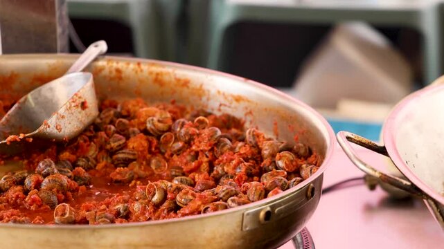 Cooking Snails in Tomato Sauce
