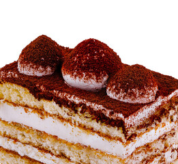 Delicious tiramisu cake sprinkled with cocoa powder on white background