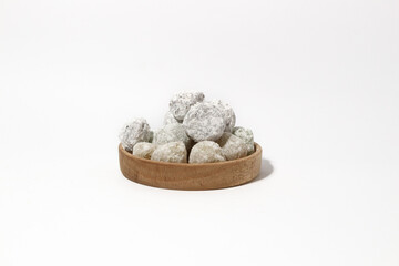Mochi - trendy and sweet dessert, Mochi cake on a plate on a white background.