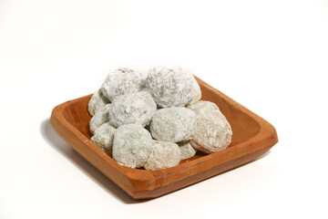 Mochi - trendy and sweet dessert, Mochi cake on a plate on a white background.