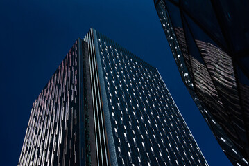 Modern glass buildings with dark blue sky background. Business skyscrapers in the Financial District, Seattle Downtown.