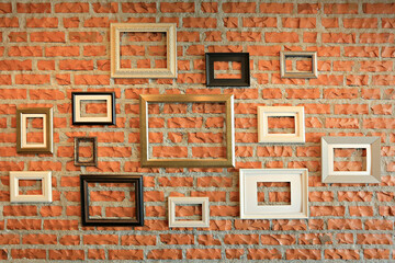 Many wooden photo frames mockup, set collection on bricks wall, interior decor 