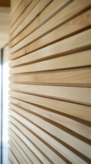 Textured wooden wall featuring horizontal slats with natural grains and a Scandinavian inspired minimalist design creating a warm and open concept architectural element or background