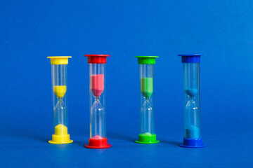 hourglass on the table, sand clock as time passing concept for business deadline, copy space