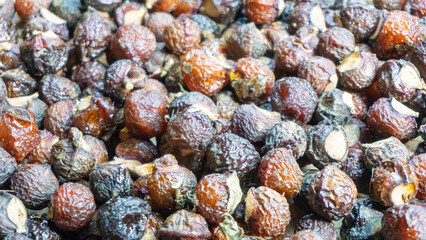 Sapindus rarak (Sapindus mukorossi, rerek, lamuran, Lerak). This fruit is made into a washing agent, a cleaner for various kitchen utensils, and soap.