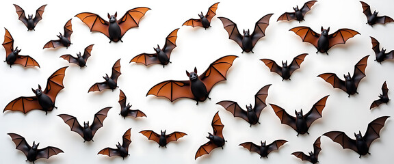 Colorful Paper Bats on White Background with Copy Space