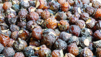 Sapindus rarak (Sapindus mukorossi, rerek, lamuran, Lerak). This fruit is made into a washing agent, a cleaner for various kitchen utensils, and soap.