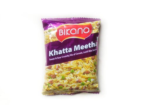 Guwahati, Assam, India - September 29, 2024 : Bikano Khatta Metha snacks. Sweet and sour crunchy mix of cereals, lentil bite snacks. 