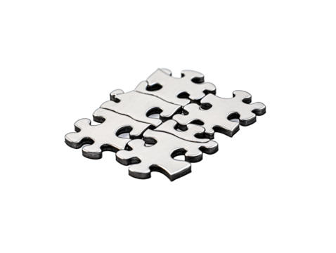 a group of silver puzzle pieces - Powered by Adobe