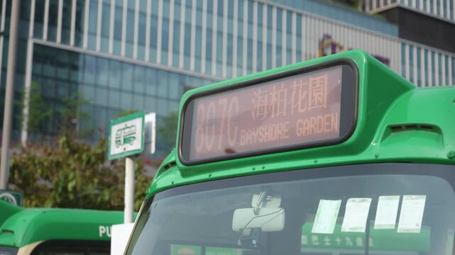 Destination sign of a minibus stoped at bus stop in Hong Kong