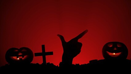 Scary dirty halloween zombie hand silhouette raising up from grave pointing finger at side,...