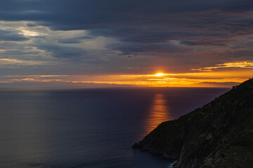Fototapeta premium Incredible sunset over Ligurian Shore, Cinque Terre Manarola Italy