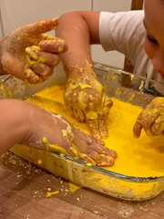 kids hands and dough 