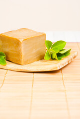 Handmade soap with herbal leaves